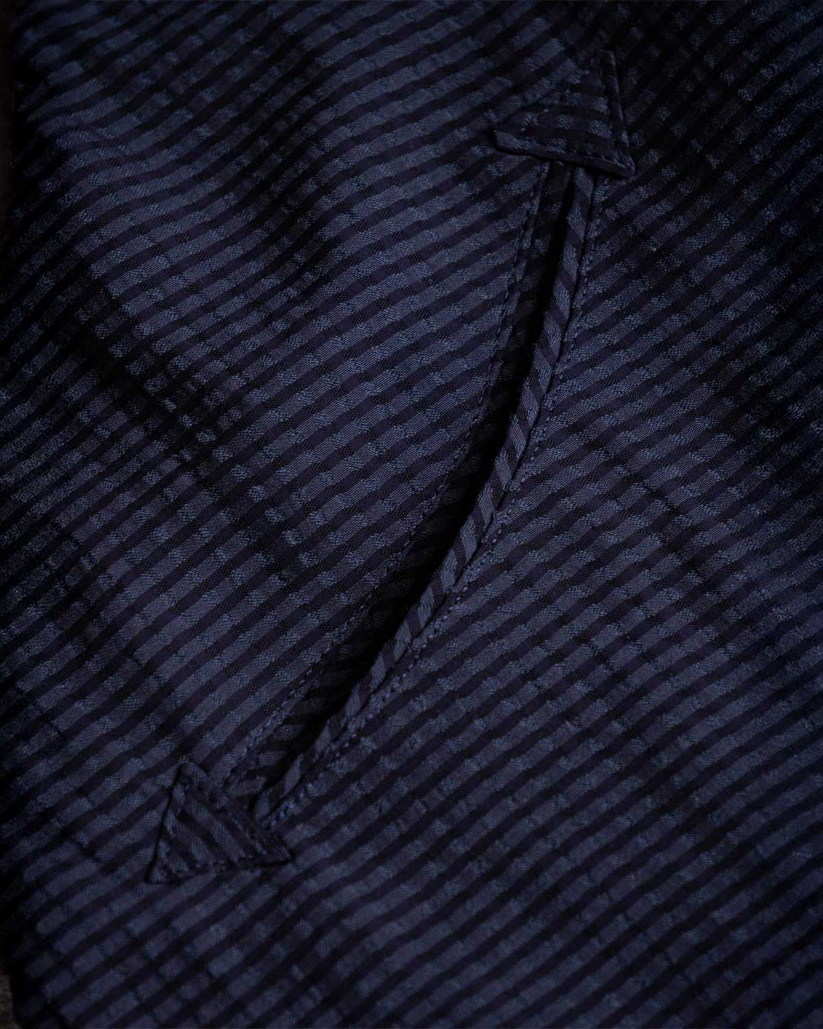 NAVY CHECK（特徴的なスマイルポケット）