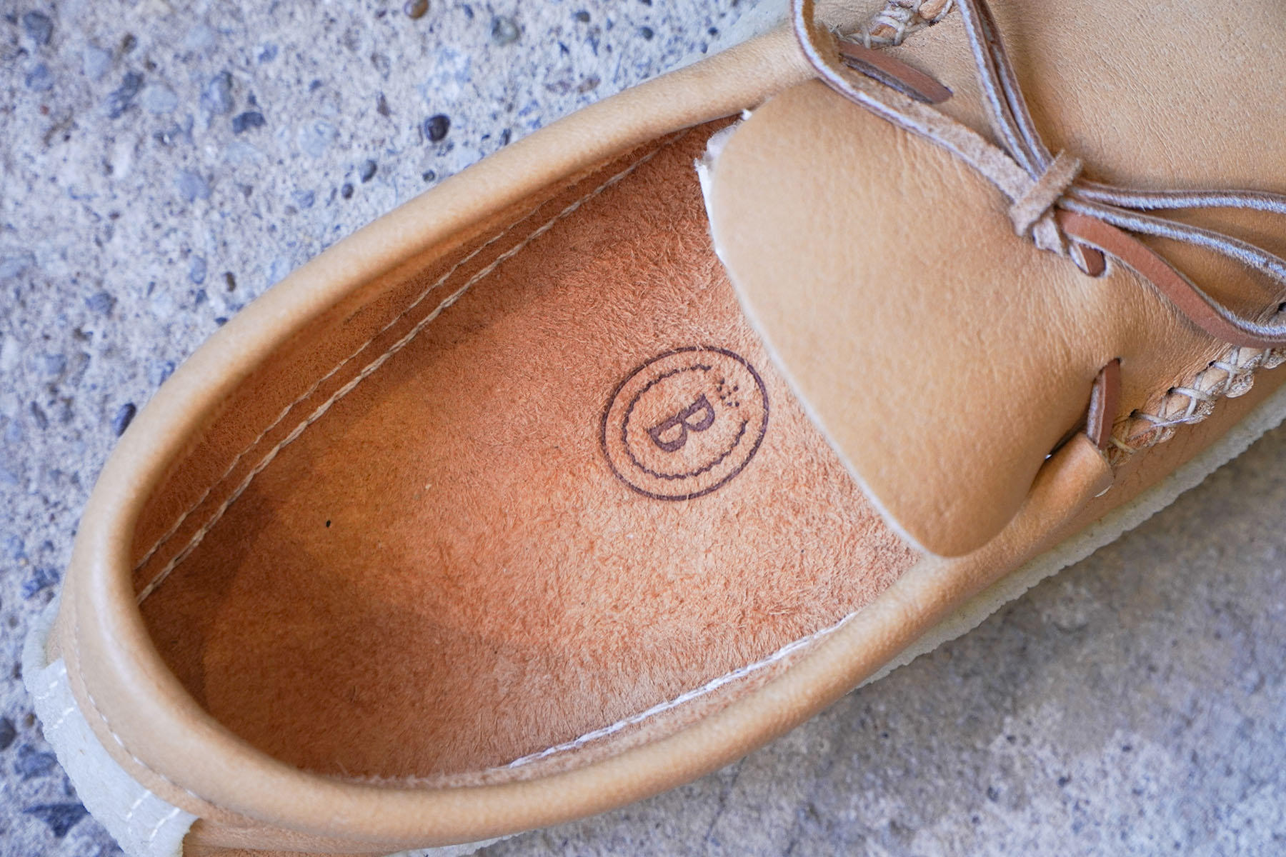 BASTIEN industries ”handsawn moccasins” logo